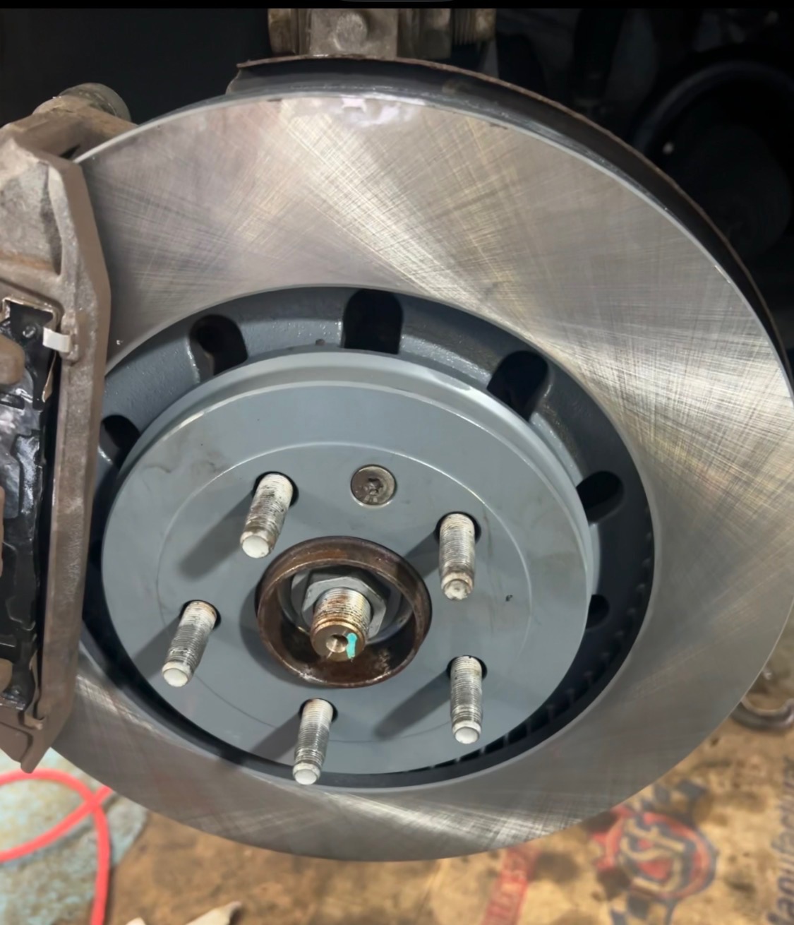 Disc brake rotor and hub assembly inspected during a brake repair service