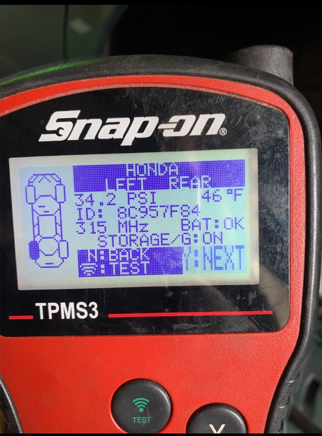 Professional automotive diagnostic scan tool used to read engine fault codes